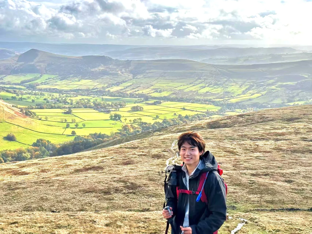 Yiqi Liu hiking in the hills
